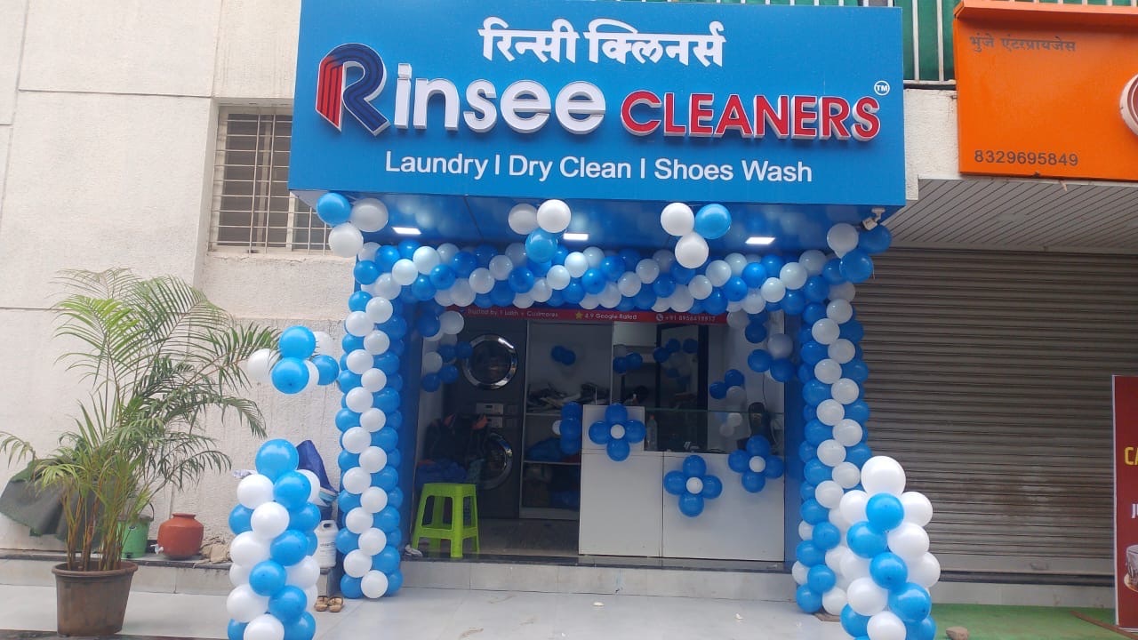 Modern Rinsee Cleaners premium laundry store interior placeholder